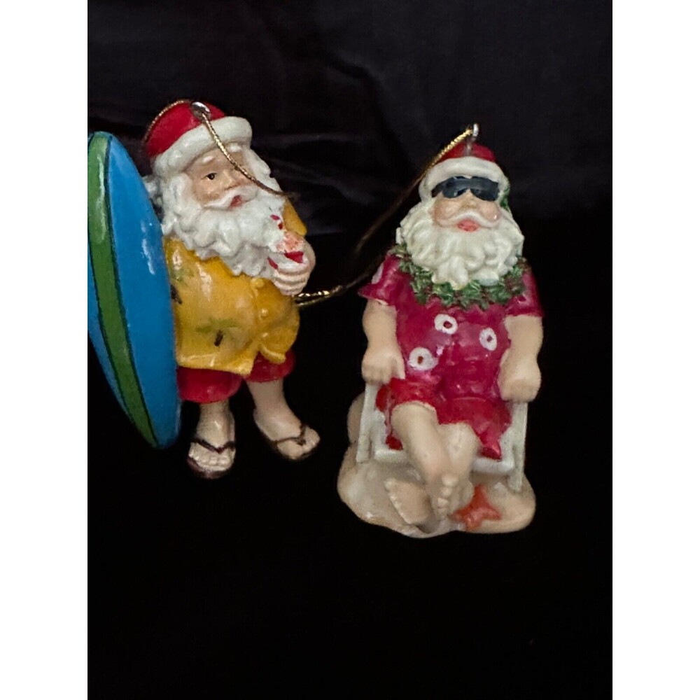 Vintage pair of Tropical Santas, 2.75” Santa on beachchair, 3.5”surfboard Santa